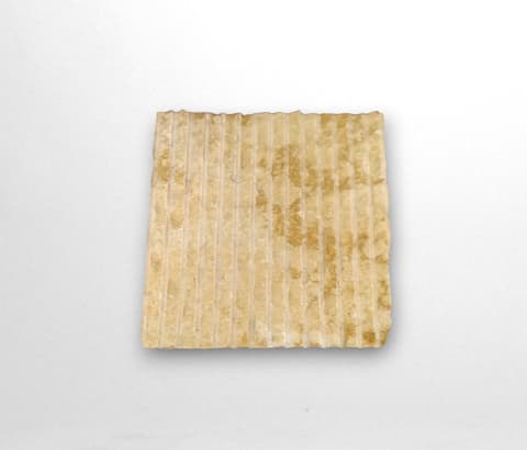 Broached limestone tile