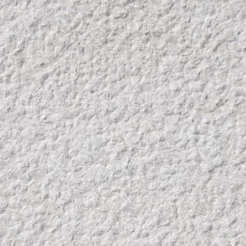 Bush-hammered limestone sample