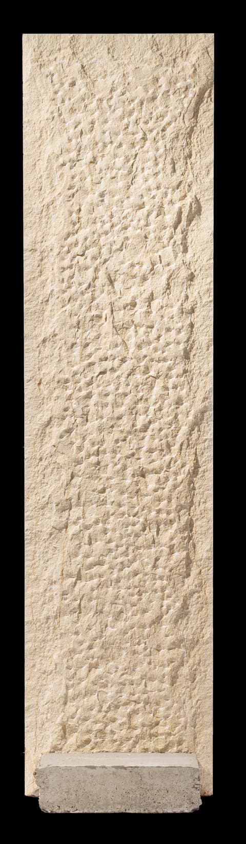 Chiseled limestone wall strip