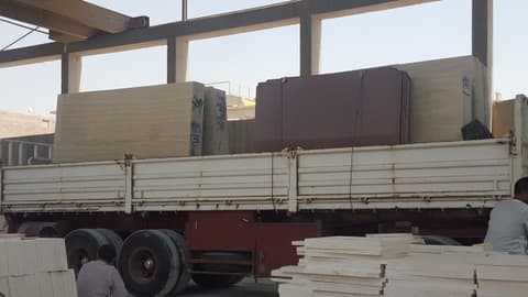 Slabs loaded on a truck for land freight to Sudan and Libya