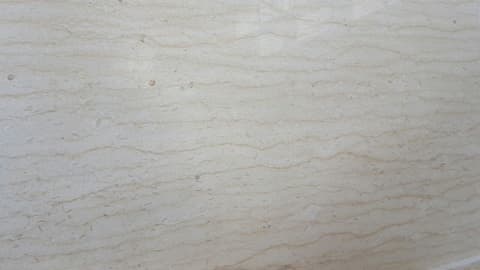 White Silvia marble with soft golden veining, polished
