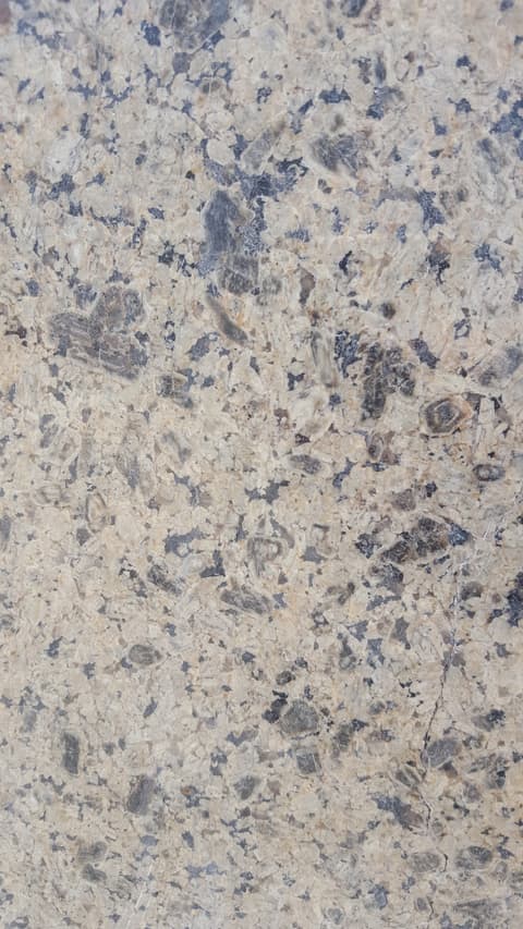 Verdi granite, light pistachio with dark speckles, polished